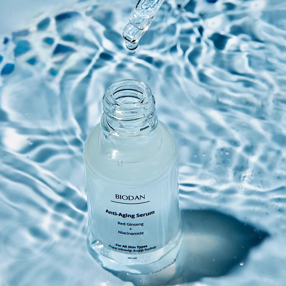 Natural anti-aging serum with hyaluronic acid for all skin types in glass dropper bottle